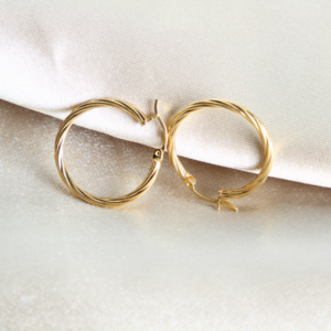 ARRACADAS DE DISEÑO ENTORCHADO EN ORO